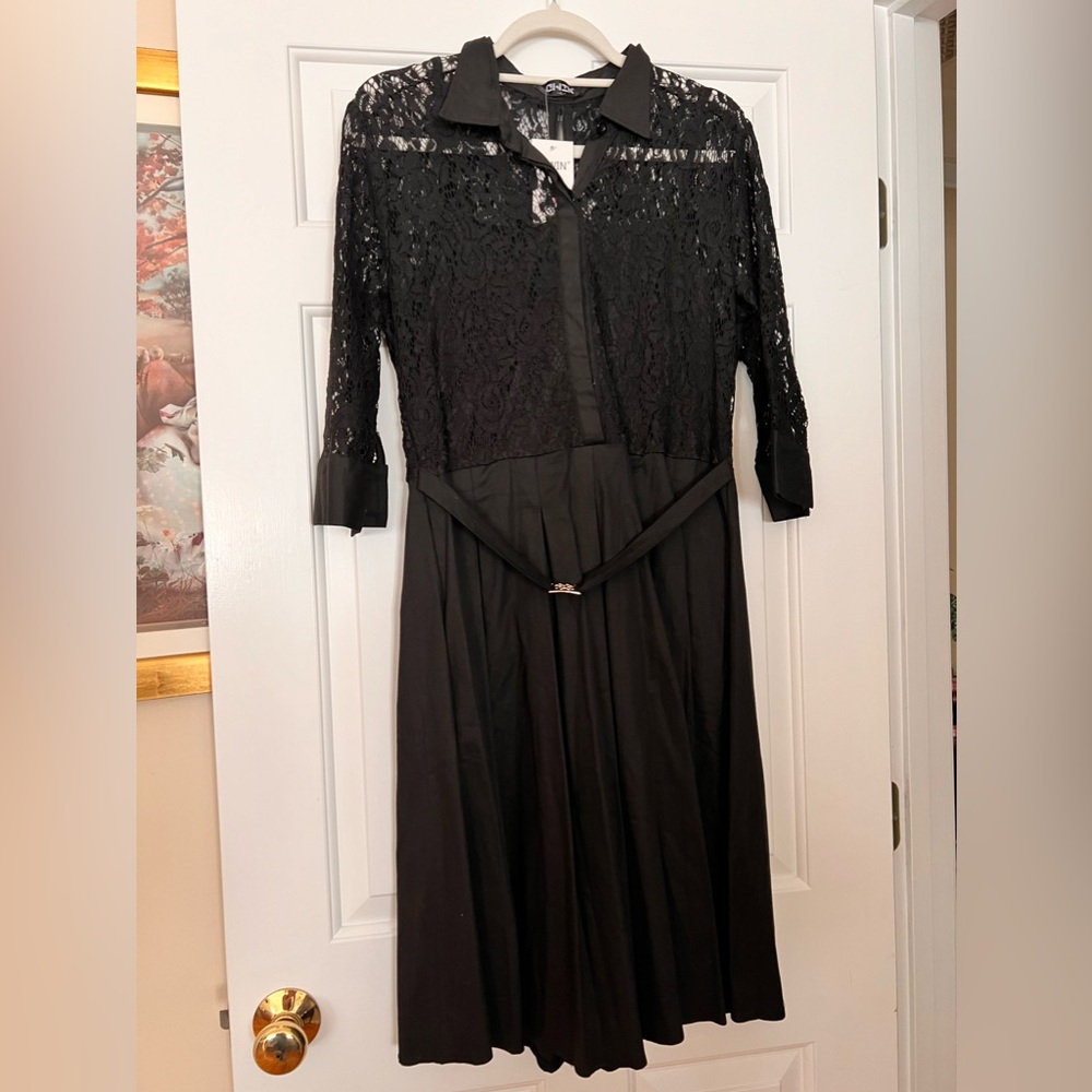 Black swing dress with lace top.